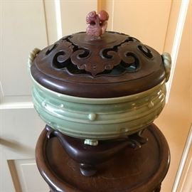 Large oriental bowl with custom stand and wooden cover and Jade? finial.  Chop mark on interior of bowl.