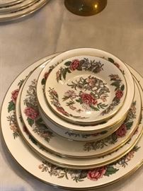 Closeup of dinner plate,luncheon plate, bread and butter, fruit bowl, finger bowl