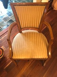 One of a pair of fruitwood armchairs