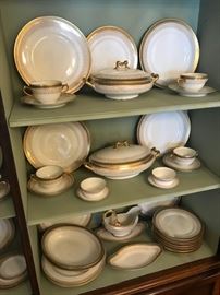 Large service of gold and white Bernardaud  Limoges china