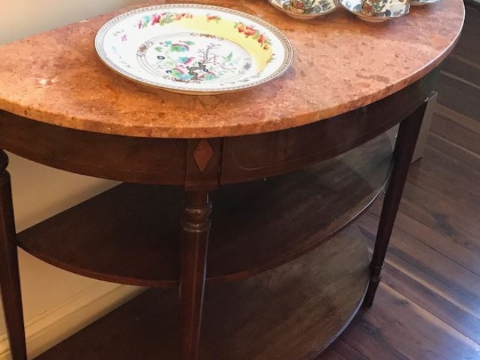 Demilune entrance table with rose marble top