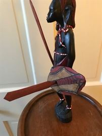Closeup of carved wooden African warrior