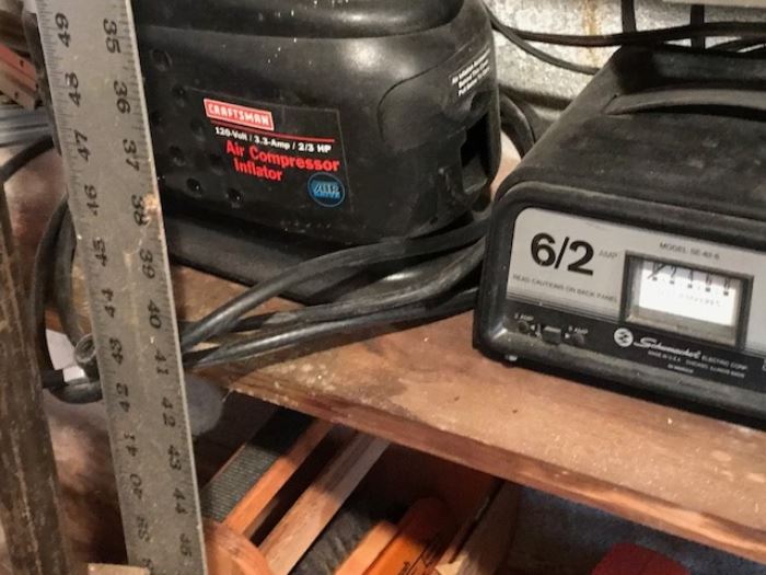 Air compresser and battery charger in basement