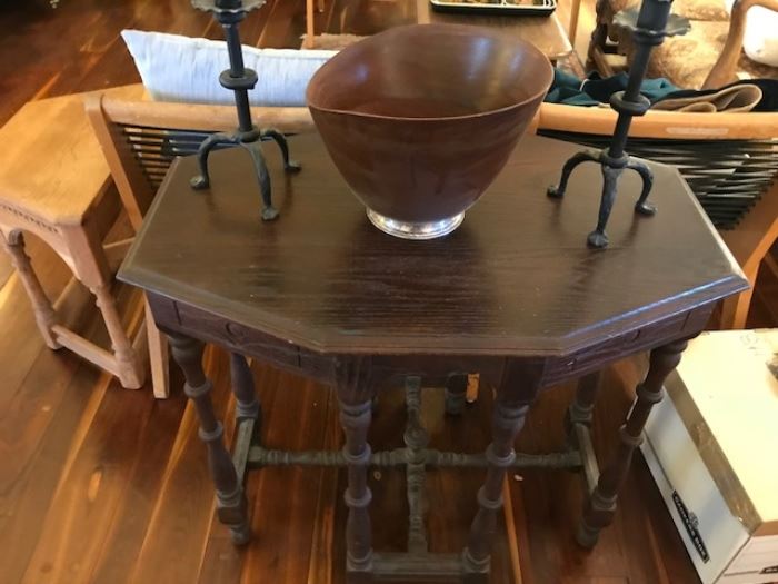Turned leg, vintage table with pair of cast-iron candlesticks and turned mahogany bowl with sterling silver base