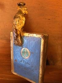 Vintage pair of atlas and bird bookends