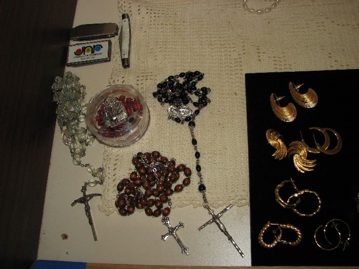 Rosaries, pen knives, jewelry