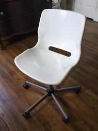 Modern white office chair on casters