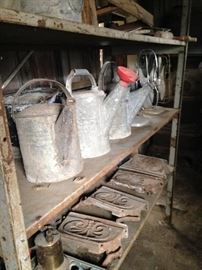 Vintage watering cans and architectural pieces