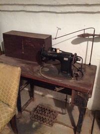 Incredible Singer Treadle machine with thread holder