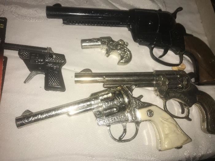 Vintage toy cap guns 