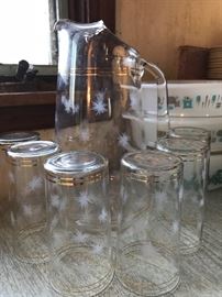 Super fun vintage pitcher and glass set 