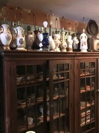 Antique arts/crafts style cabinets and a variety of vintage lamps 