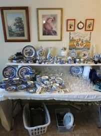 Vintage Blue Willow And Blue Delft. There's a non working Roomba underneath the table and Vintage Yearbooks