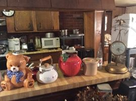 Teapots, cookie jars, clock