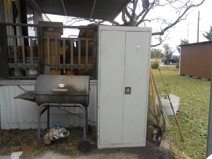 bbq pit and tool cabinet