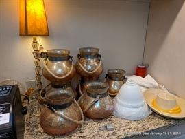Assorted vintage-style hanging lantern globes.