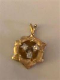 gold and diamond rose charm