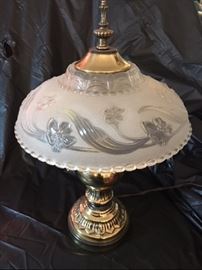 electric lamp with brass base and top