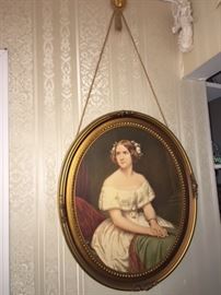 oval portrait of lady with medallion cord hanger