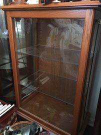 oak display case with glass shelves 