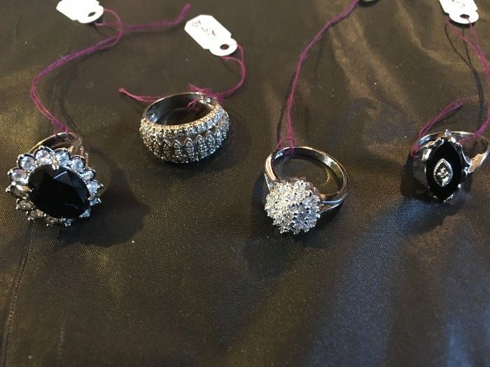 assortment of ladies 10 K gold diamond rings