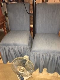 pair of custom fabric high back chairs