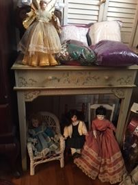 nice porcelain doll collection and wicker and hand made chairs and nice writing table