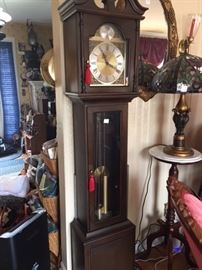 beautiful grand- daughter clock, marble top plant stand, and beautiful stain glass lamp