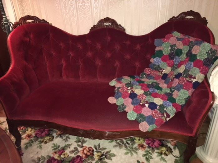 nice cherry carved love seat with hand made quilt cover