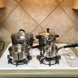 Like new stainless steel pots and pans with glass lids