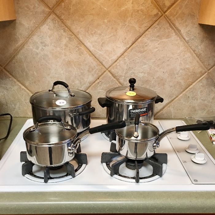 Like new stainless steel pots and pans with glass lids
