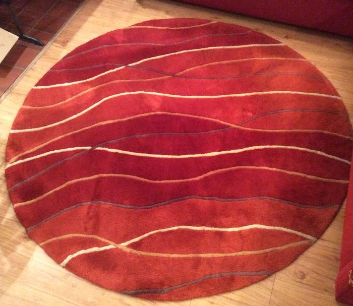 Hand tufted "Sahara Waves" 66" round wool rug (purchased at Del-Teet)