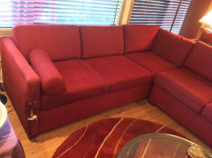 Rusty red L-shaped sectional sofa - with cat claw damage at both ends