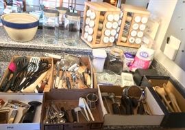 Mixing bowls, glass canisters, assorted kitchen utensils, 32 jar revolving spice racks