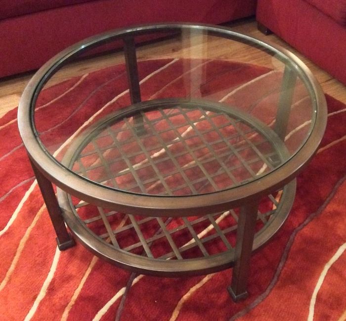 32" round bronzed metal & glass coffee table from Del-Teet