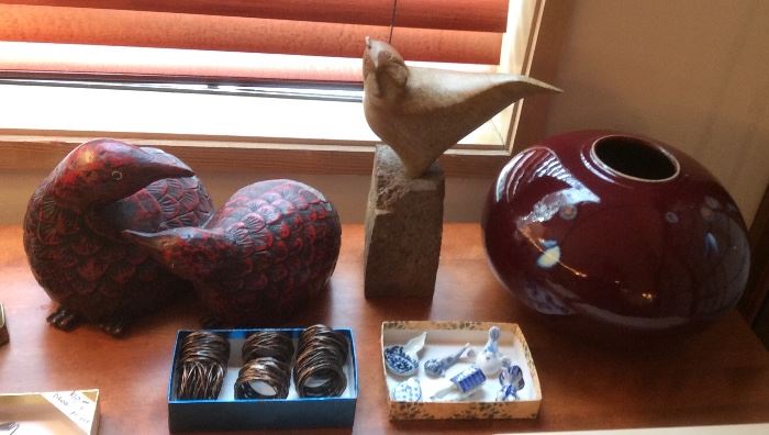 Red lacquer bird figurine, carved stone bird, Gerald Newcomb pot, wire napkin rings & ceramic figural chopstick rests