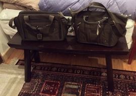 Dark wood bench (42" long), carry-on bags by Atlantic