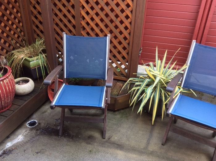 More plants in pots, pair of Kingsley-Bate teak folding patio chairs