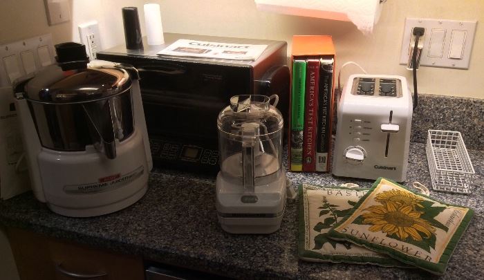 Acme Supreme Juicerator juicer, Cuisinart Convection oven/toaster broiler, Kitchenaid Chef's chopper, Cuisinart toaster