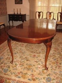 Cherry dining table with two leaves