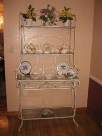 Baker's wrought iron rack with  teapots and teacups