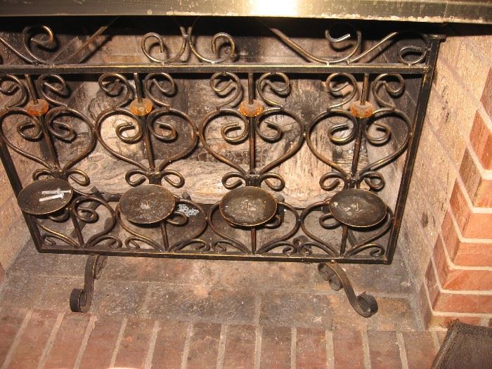 Black wrought iron candle holder screen
