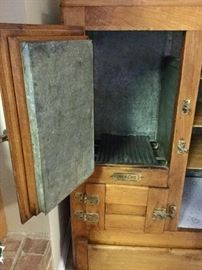 Inside look at the antique ice box. 
