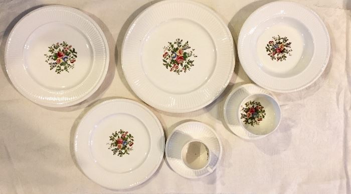 Wedgewood dinnerware.  "Conway" dinner plates, salad plates, bread plates, rimmed soup, cup and saucer and demitasse cup and saucer.