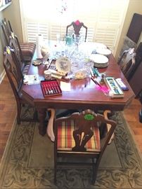 vintage dining room table and chairs, glassware, rug