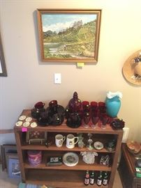 bookcase is not for sale but all glassware is, ruby red plates, saucers, cups, glassware