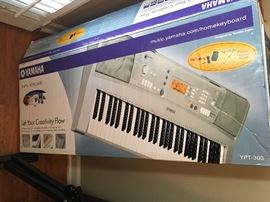 Yamaha keyboard with stand