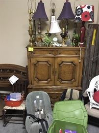 several lamps, chest on chest cabinet