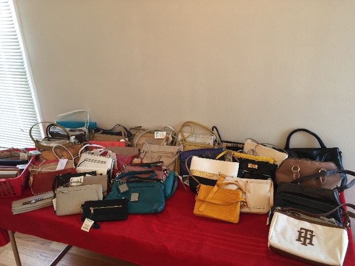 We have over 100 new purses!  Brands include:  Nine West, Tommy Hilfiger, Stone Mountain, Izod,  & Tignanello