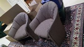 2 like new Striped Club Chairs.